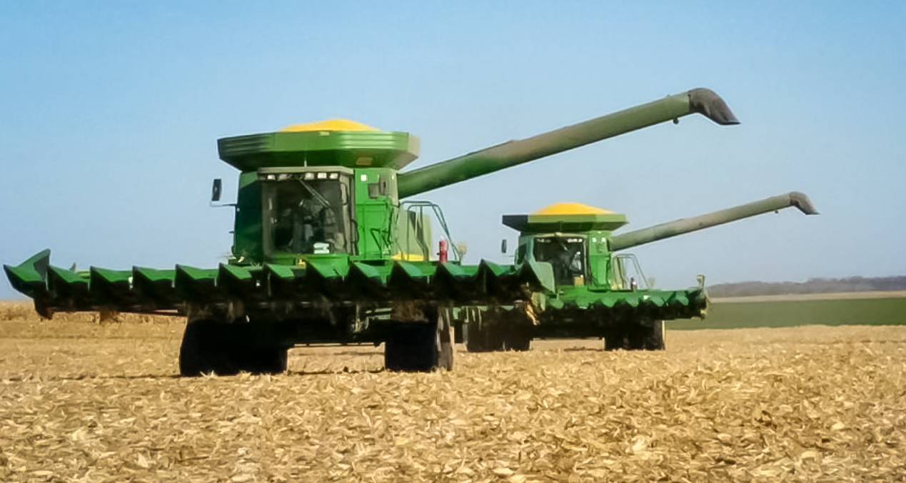 Picture of combines in a field.